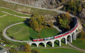 brusio.viaduct  --> The Bernina Express passes over  the world famous  Brusio Viaduct &nbsp; ( credit ). The stone viaduct bridge spans 360 ft (110 m) over  9 arches, each of which span 33 ft (10 m).