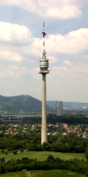 donauturm  --> We viewed the city of Vienna from the top of the  Danaturm  (Danube Tower, image from web).The two rows of windows circling the top under the antenna are at the viewing deck and a rotating restaurant. We ate a nice lunch there and took a few pictures (of course).